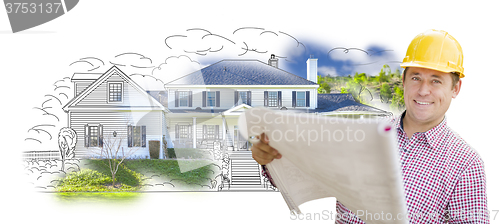 Image of Contractor Holding Blueprints Over Custom Home Drawing and Photo