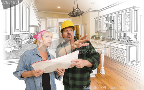 Image of Contractor Talking with Customer Over Kitchen Drawing and Photo 