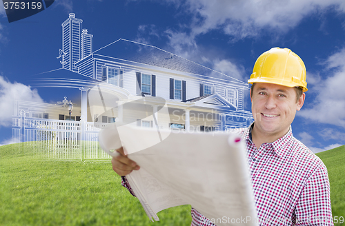 Image of Contractor Holding Blueprints Over Custom Home Drawing and Photo