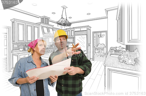 Image of Contractor Talking with Customer Over Kitchen Drawing