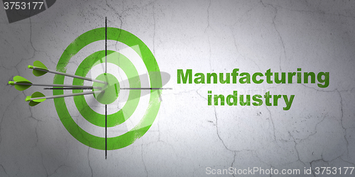 Image of Manufacuring concept: target and Manufacturing Industry on wall background