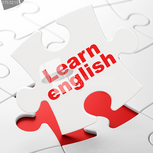 Image of Education concept: Learn English on puzzle background