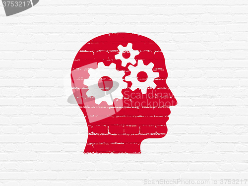 Image of Education concept: Head With Gears on wall background