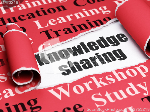 Image of Learning concept: black text Knowledge Sharing under the piece of  torn paper