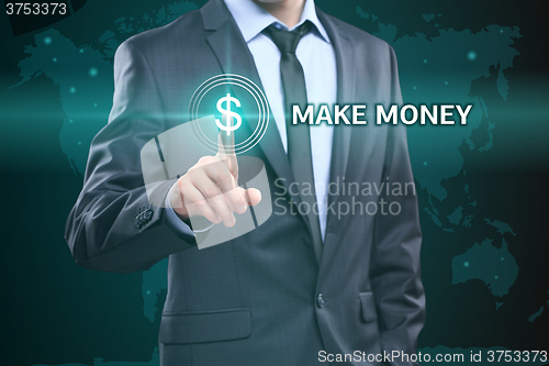 Image of business, technology, internet concept - businessman pressing make money button on virtual screens