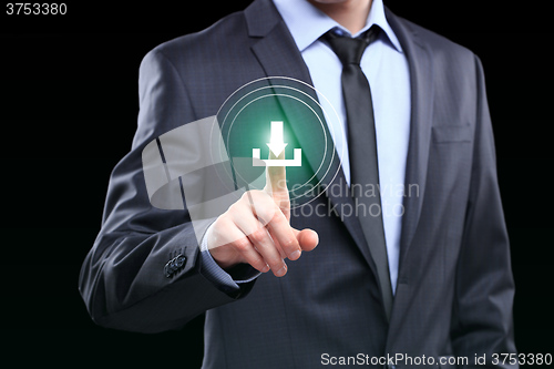 Image of Businessman pushing download icon with virtual screen.