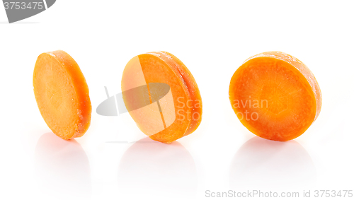 Image of carrot slices on white background