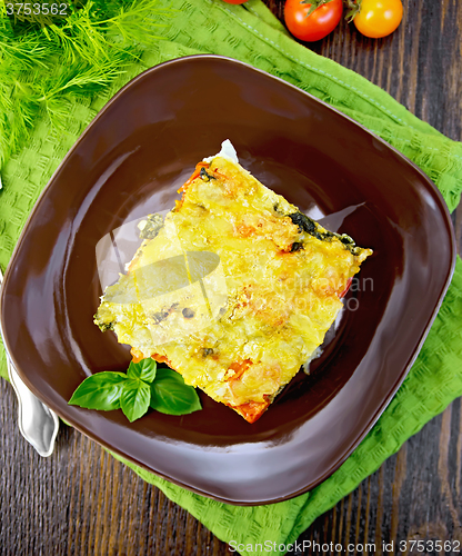 Image of Pie potato with tomato on board top