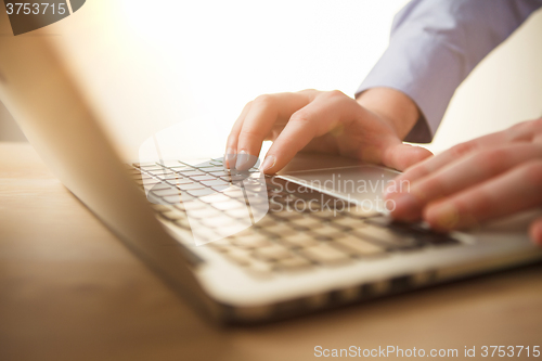 Image of hands on the keyboard