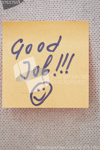 Image of Good job written on a sticky note