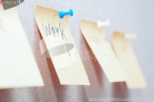 Image of Work written on a sticky note