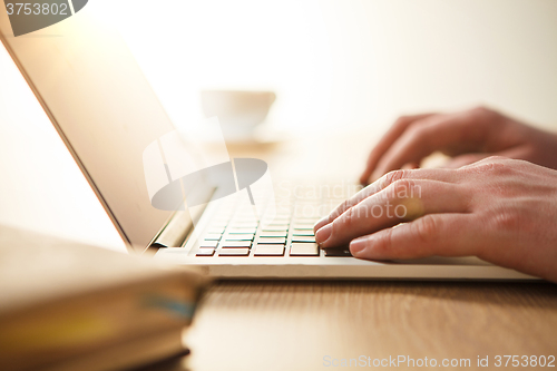 Image of hands on the keyboard