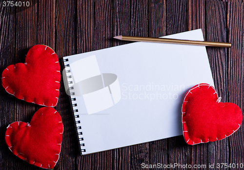 Image of note book and hearts