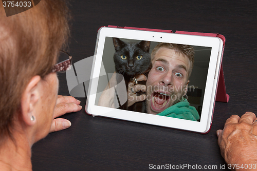 Image of Senior woman with tablet
