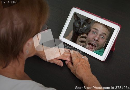 Image of Senior woman with tablet