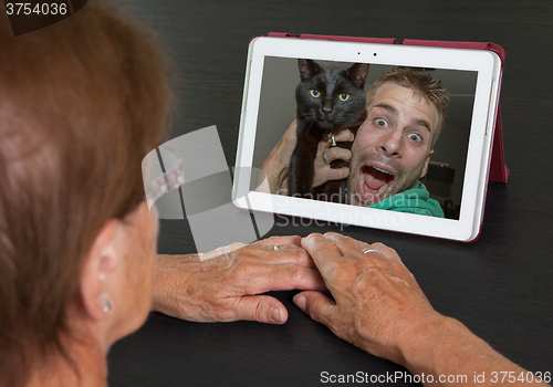 Image of Senior woman with tablet