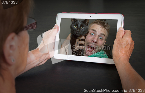 Image of Senior woman with tablet