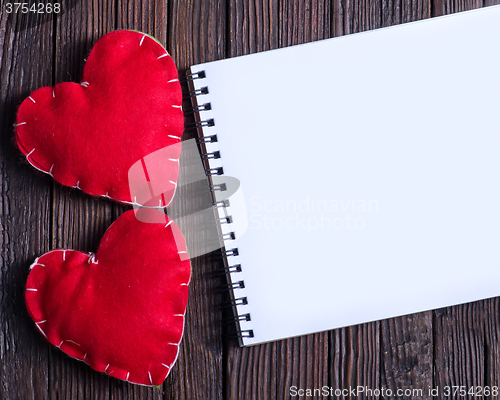 Image of note book and hearts