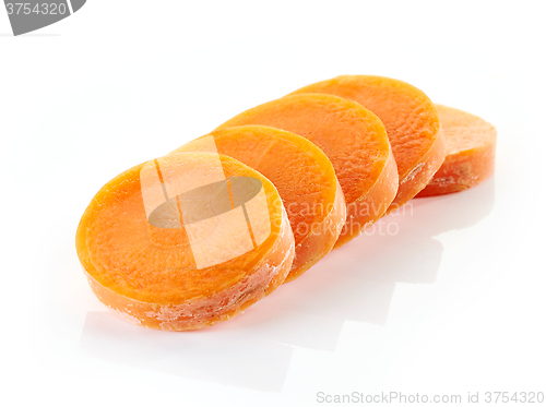 Image of carrot slices on white background