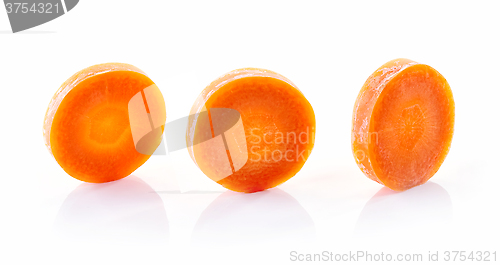 Image of carrot slices on white background