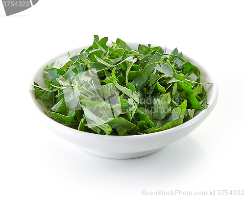 Image of bowl of chopped parsley