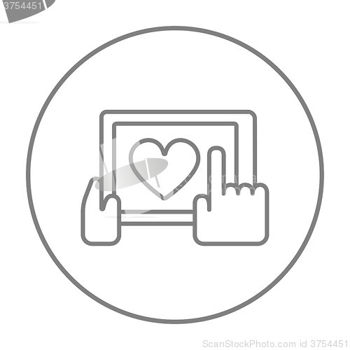 Image of Hands holding tablet with heart sign line icon.