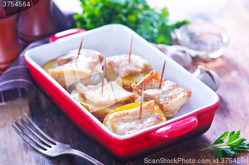 Image of baked potato with lard