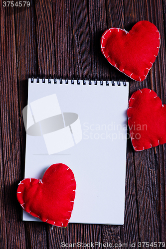 Image of note book and hearts