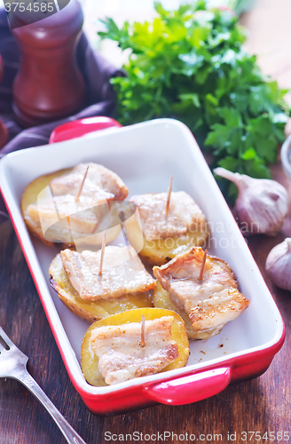 Image of baked potato with lard