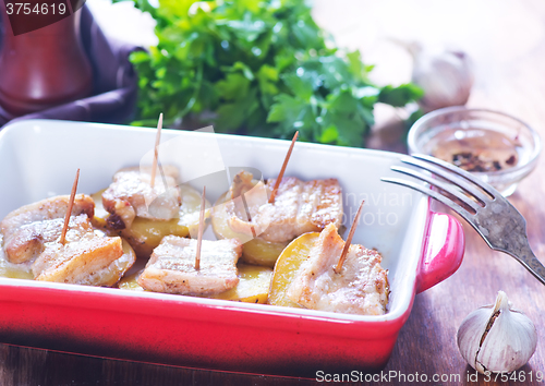 Image of baked potato with lard