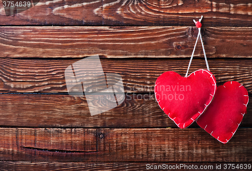 Image of hearts on wood