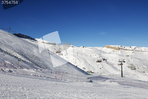 Image of Ski slope and chair-lift at sun day