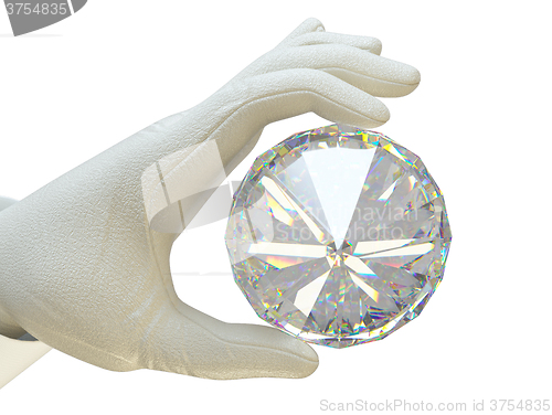 Image of Hand in white glove holding huge gemstone