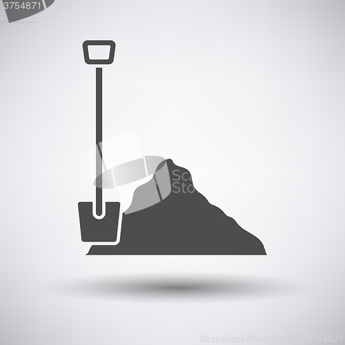 Image of Construction shovel and sand icon 
