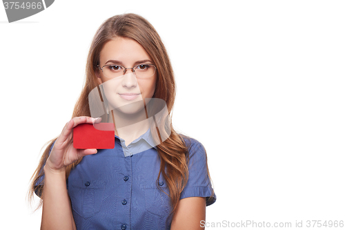 Image of Confident business woman in glasses showing blank credit card