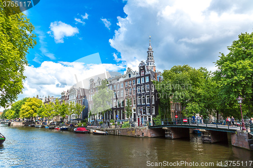 Image of Amsterdam canals and  boats, Holland, Netherlands.