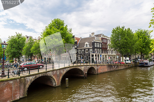 Image of Amsterdam canals and  boats, Holland, Netherlands.