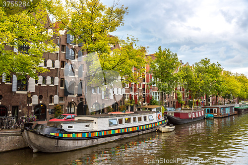 Image of Amsterdam canals and  boats, Holland, Netherlands.