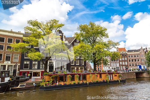 Image of Amsterdam canals and  boats, Holland, Netherlands.