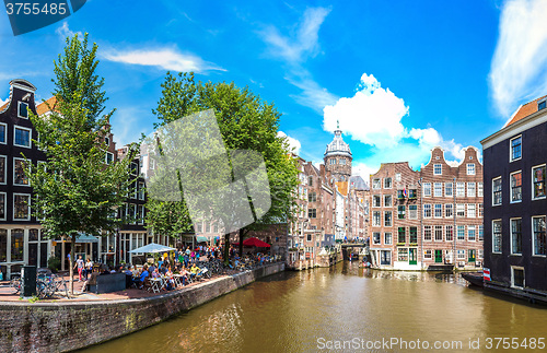 Image of Canal and St. Nicolas Church in Amsterdam