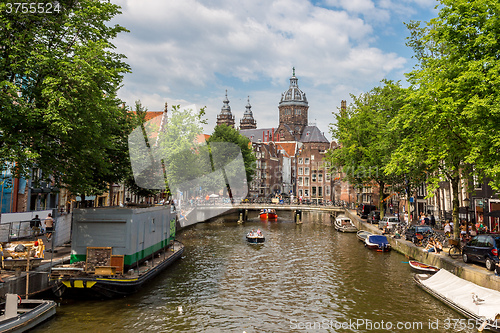 Image of Canal and St. Nicolas Church in Amsterdam