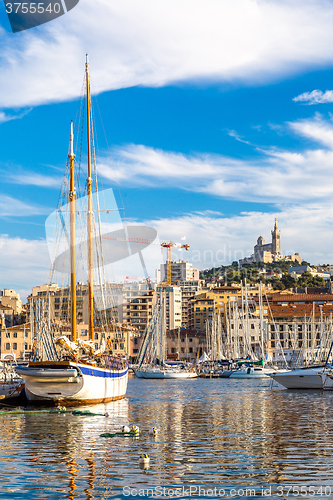 Image of Notre Dame de la Garde and olf port in Marseille, France