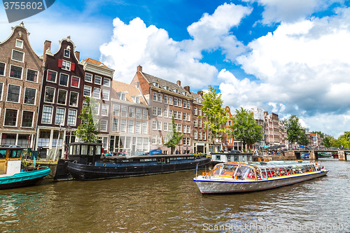 Image of Amsterdam canals and  boats, Holland, Netherlands.