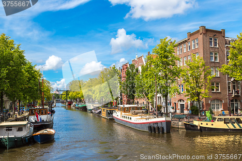 Image of Amsterdam canals and  boats, Holland, Netherlands.