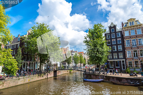 Image of Amsterdam canals and  boats, Holland, Netherlands.