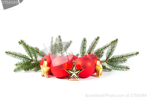 Image of red Christmas balls and fir branch