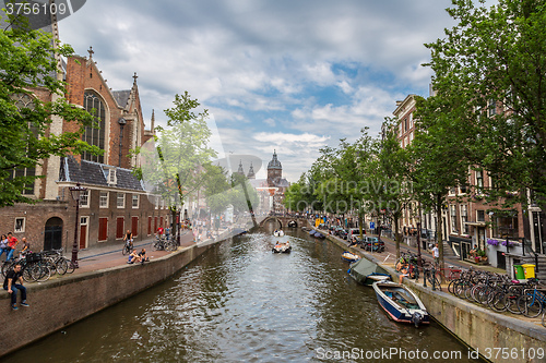 Image of Canal and St. Nicolas Church in Amsterdam