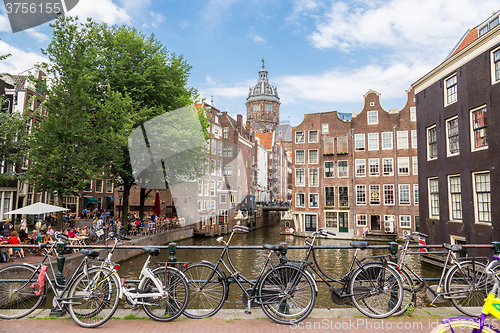 Image of Bicycles on a bridge over the canals of Amsterdam