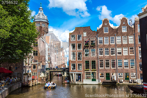 Image of Canal and St. Nicolas Church in Amsterdam