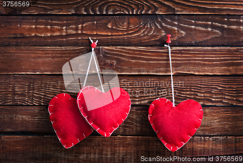 Image of hearts on wood